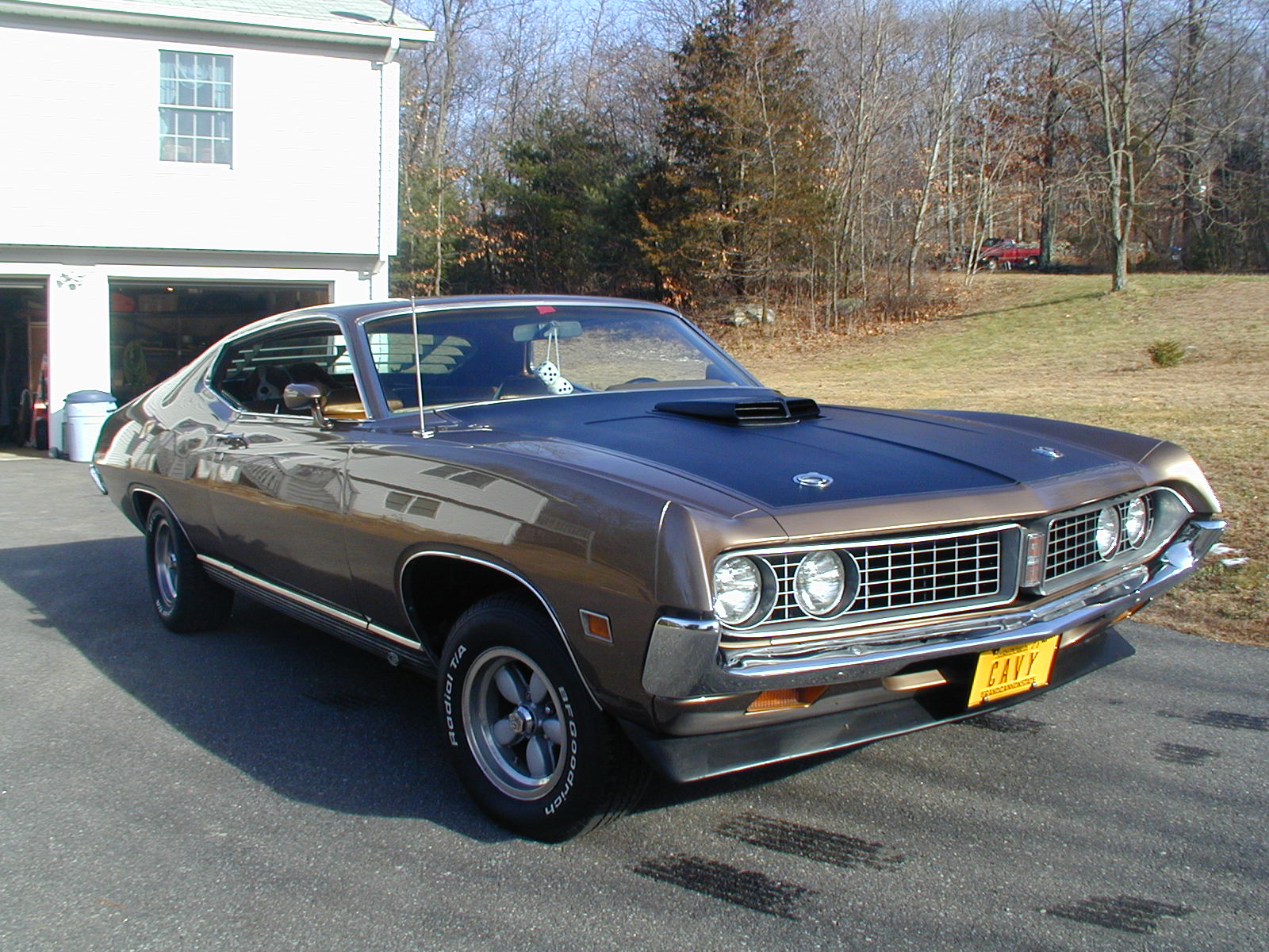 Ford Torino desktop wallpaper featuring a stylish and powerful vehicle amidst a captivating background.