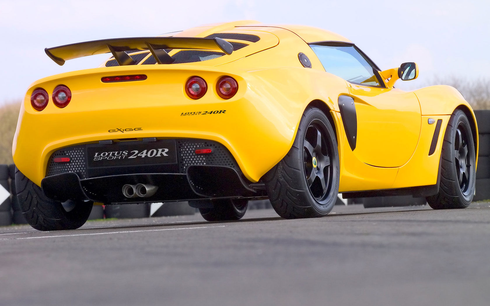Lotus Cars parked in stunning HD desktop wallpaper.