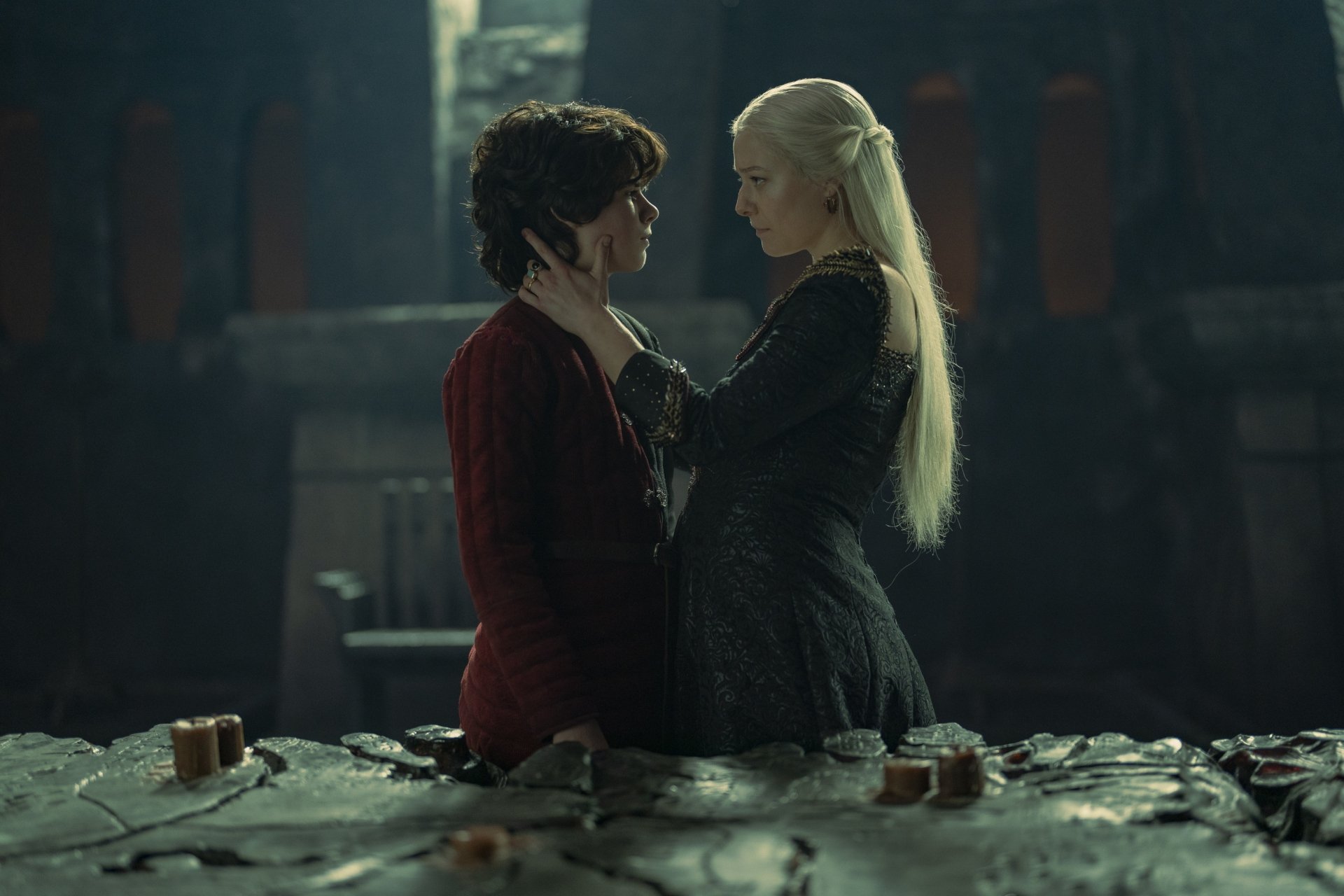 Rhaenyra Targaryen, played by Emma D'Arcy, shares an intimate moment in a dark, dramatic scene from the TV show House of the Dragon in 4K Ultra HD.