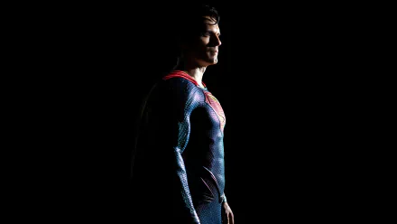 Henry Cavill as Superman in a dramatic pose from the Black Adam movie, captured in stunning 8K Ultra HD for a PC desktop wallpaper and background.