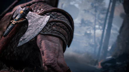 Close-up 4K Ultra HD PC wallpaper of Kratos wielding his axe from the video game God of War (2018), set against a misty forest background.