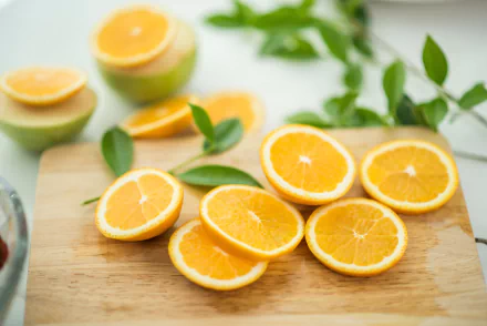Vibrant orange slices arranged elegantly in a high-definition desktop wallpaper and background.