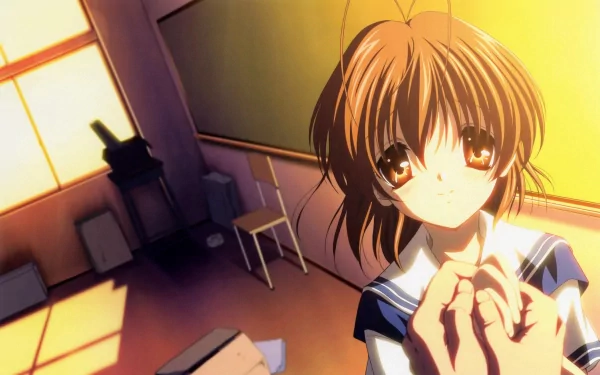 Nagisa Furukawa from Clannad is shown in a warmly lit classroom, holding hands and gazing gently, captured in a 4K Ultra HD anime desktop wallpaper.