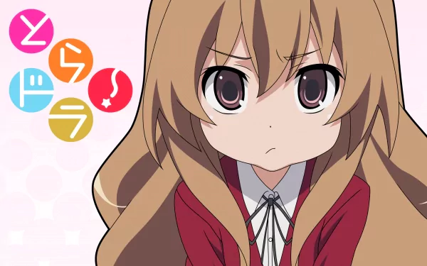 High-definition desktop wallpaper featuring Taiga Aisaka from the anime Toradora!, showcasing her signature expression and vibrant style against a colorful background.