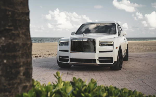 Luxurious Rolls-Royce Cullinan vehicle showcased in stunning high definition desktop wallpaper and background.