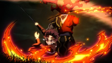 HD PC desktop wallpaper featuring an intense scene from the anime Demon Slayer: Kimetsu no Yaiba, showcasing dynamic fiery action and vibrant colors.