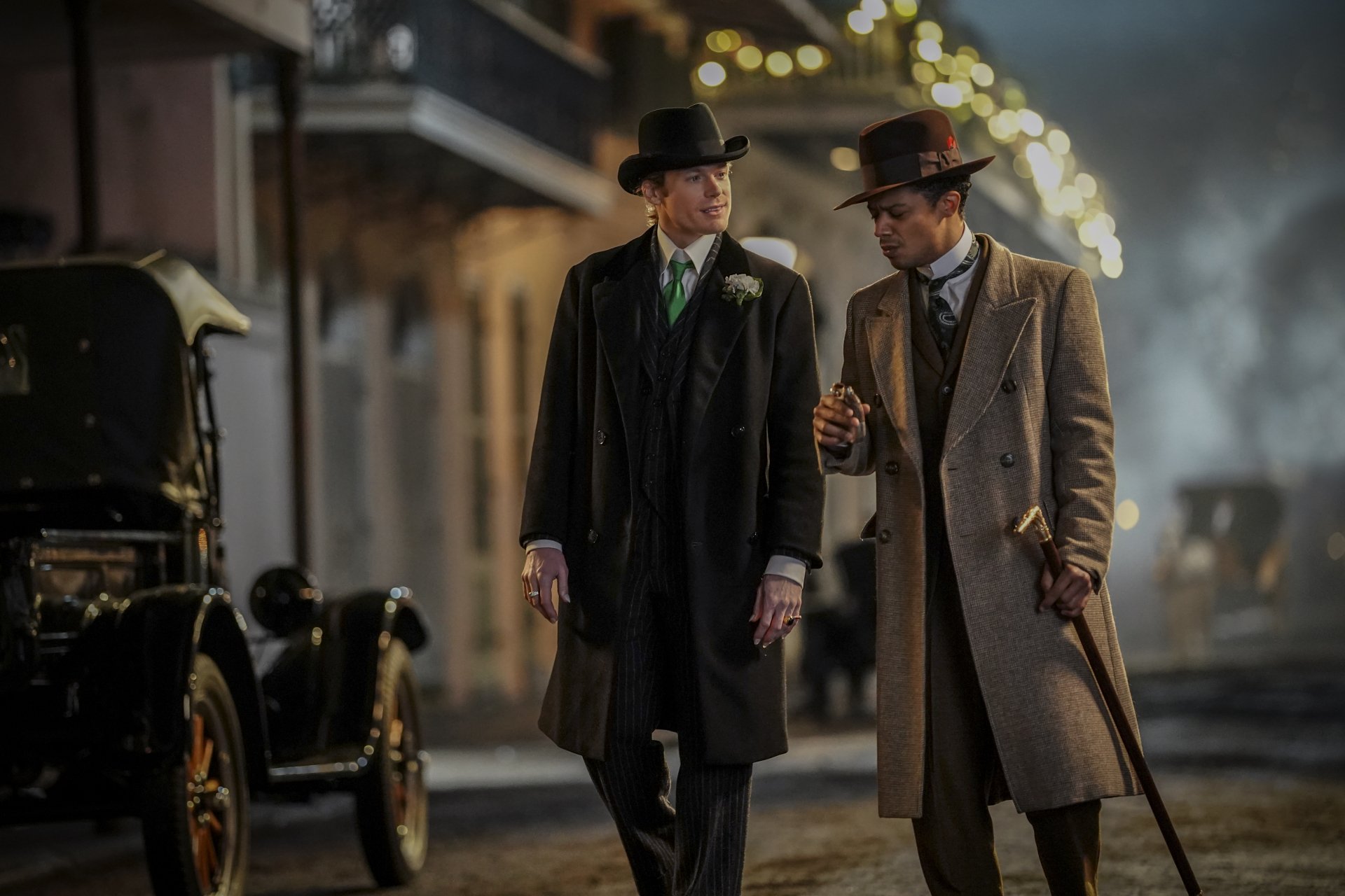 HD desktop wallpaper featuring two well-dressed gentlemen walking at night in a vintage setting, reminiscent of 'Interview with the Vampire' atmosphere.