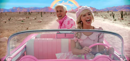 HD desktop wallpaper featuring two actors portraying iconic characters in the 2023 Barbie movie, joyfully riding in a pink convertible under a rainbow.