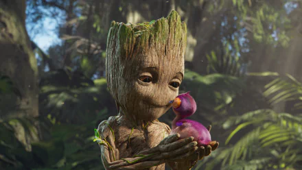 HD desktop wallpaper of Groot from the TV show I Am Groot, holding a purple bird in a lush forest.
