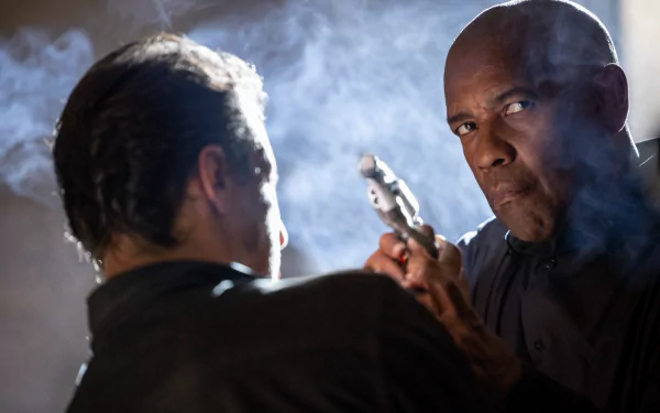 HD desktop wallpaper from The Equalizer 3, featuring a tense confrontation scene with a focused man holding a gun.