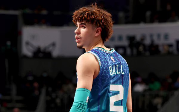 Alt Text: Charlotte Hornets player wearing number 2 jersey on the basketball court - HD desktop wallpaper featuring NBA theme.