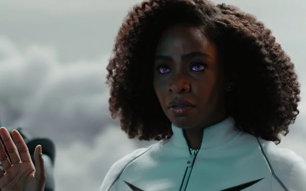 A striking HD wallpaper featuring Teyonah Parris from the movie The Marvels, showcasing her in a dramatic pose against a cloudy backdrop.