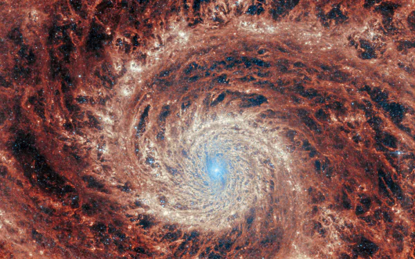 HD wallpaper of a galaxy image inspired by James Webb Space Telescope data, featuring vibrant, swirling cosmic structures and a bright center, capturing a sci-fi ambiance.