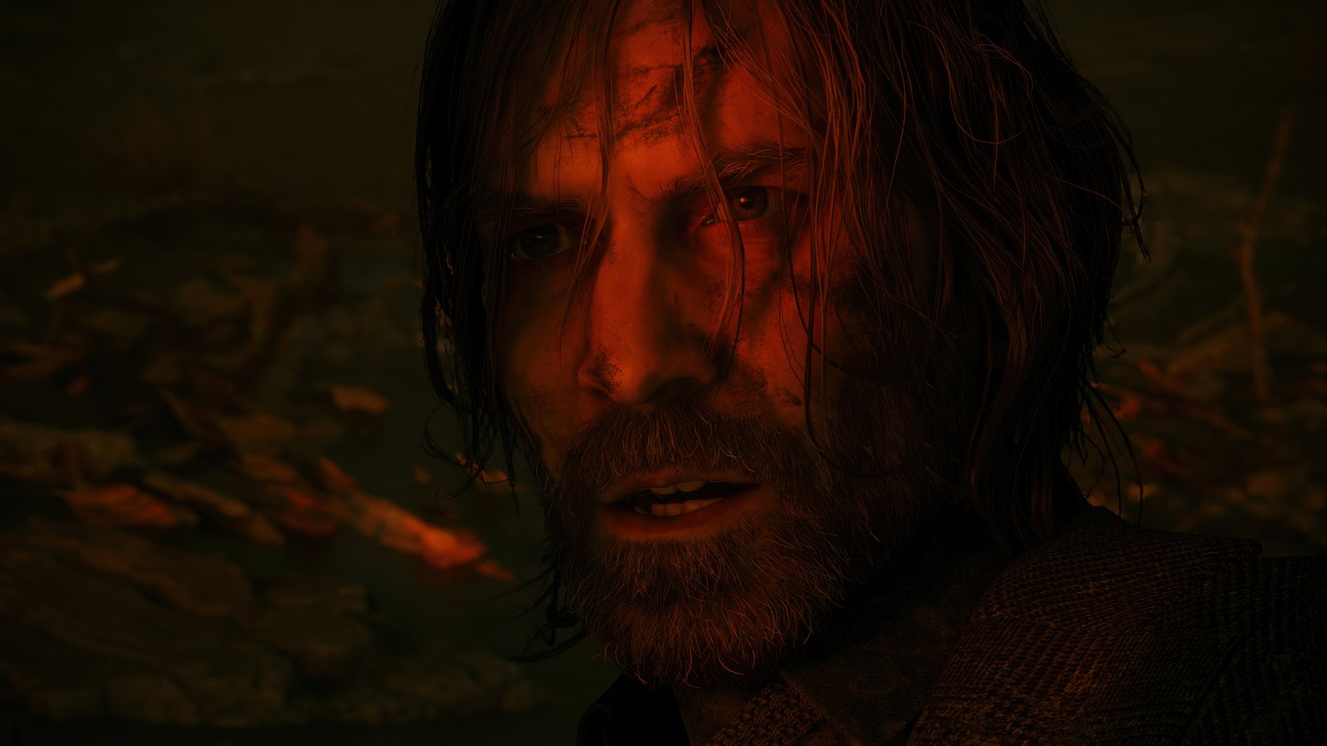 HD desktop wallpaper of Alan Wake 2 featuring a close-up of a gritty male character with an intense gaze, set against a dark, moody background.