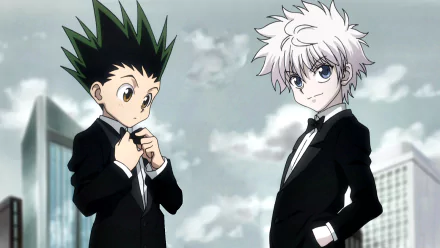 HD PC desktop wallpaper featuring Gon Freecss and Killua Zoldyck from the anime Hunter x Hunter dressed in black suits against a cloudy sky background.