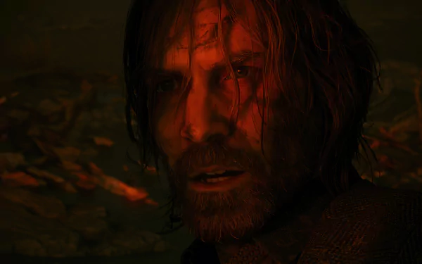 HD desktop wallpaper of Alan Wake 2 featuring a close-up of a gritty male character with an intense gaze, set against a dark, moody background.