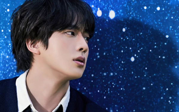A captivating HD wallpaper featuring Kim Seok-jin from BTS, set against a stunning starry background, showcasing his profile with an expressive gaze.