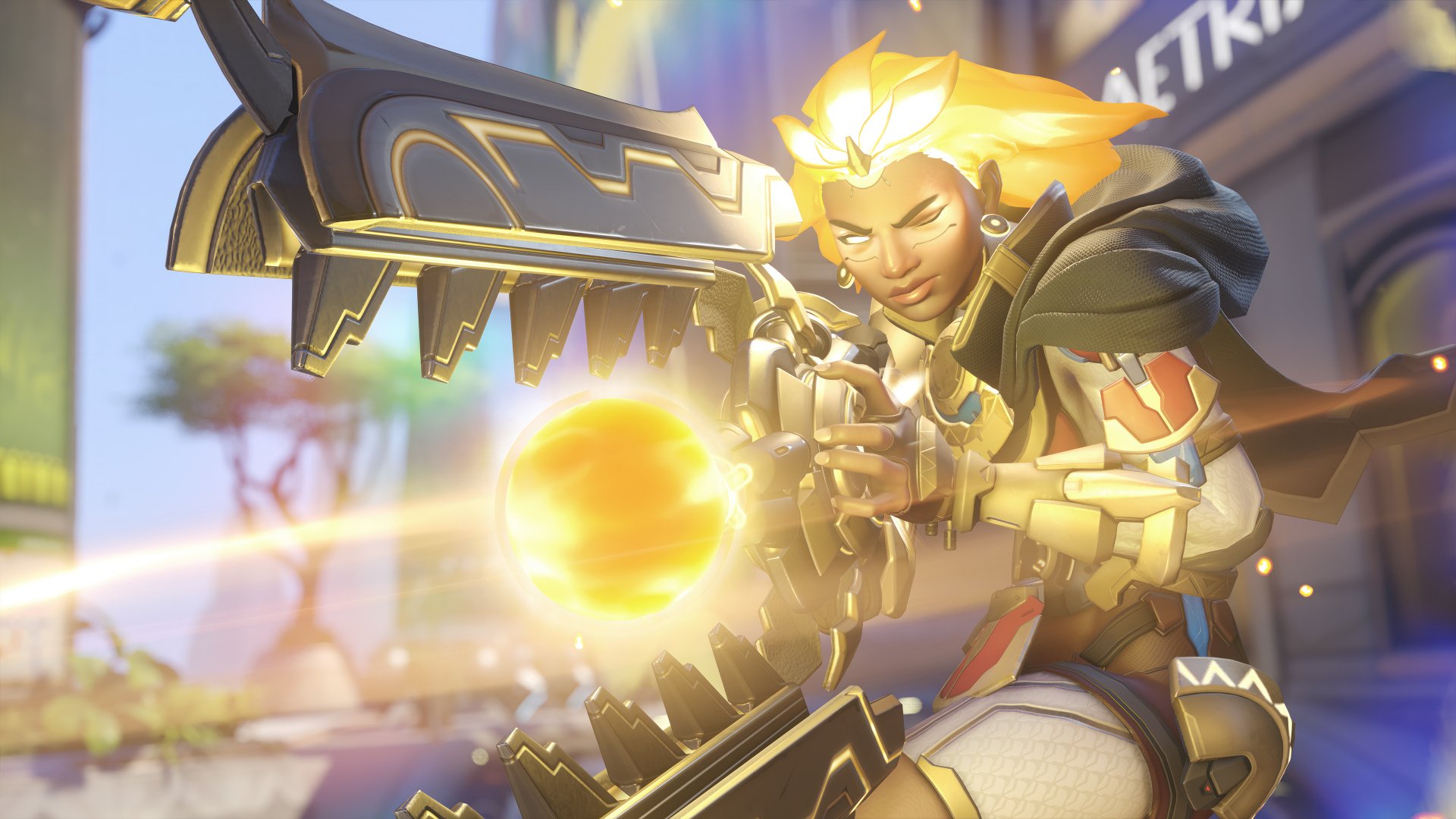 Illari from Overwatch 2 is depicted in this HD desktop wallpaper, showcasing her dynamic pose as she wields a powerful weapon, surrounded by a vibrant background.