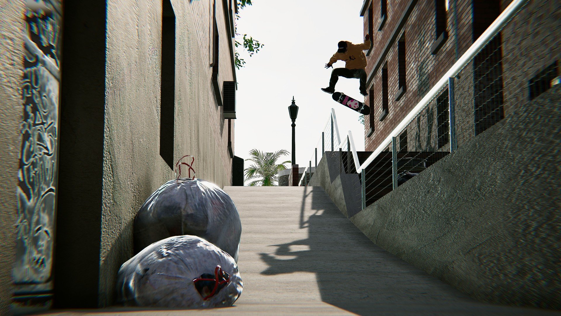 HD wallpaper featuring a Skater XL gameplay scene with a skater performing a trick on a sunny urban alleyway.
