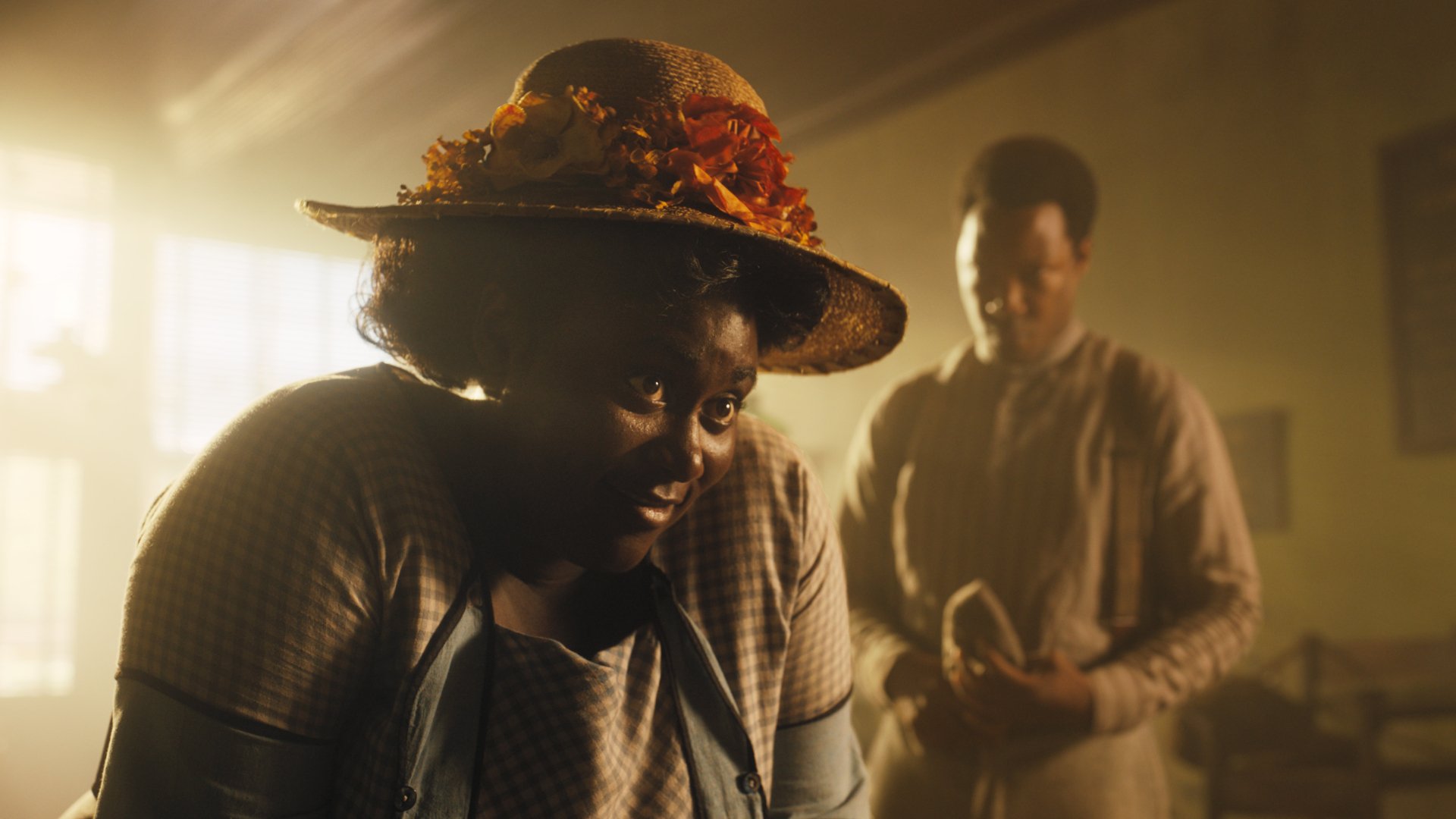 HD desktop wallpaper scene from the 2023 movie The Color Purple featuring characters in period costume with dramatic lighting.