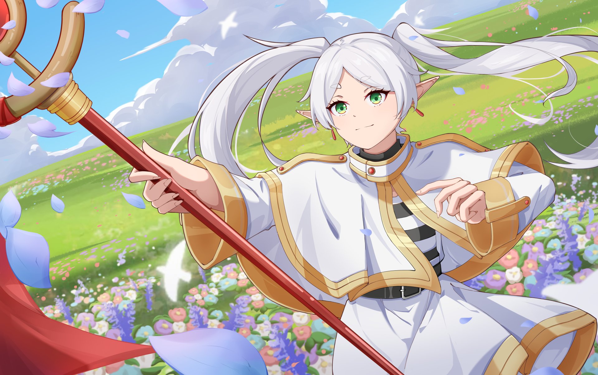 Anime character from Frieren: Beyond Journey's End stands in a vibrant field of flowers, holding a staff with a blue sky backdrop in this 4K Ultra HD PC desktop wallpaper.