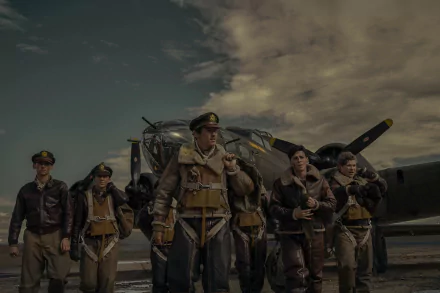 HD wallpaper featuring characters from the TV show Masters of the Air, standing confidently in front of a vintage military airplane with a dramatic sky in the background.