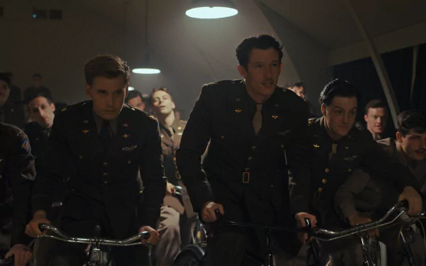 Scene from Masters of the Air TV show featuring uniformed characters on bicycles, available as HD desktop wallpaper and background.