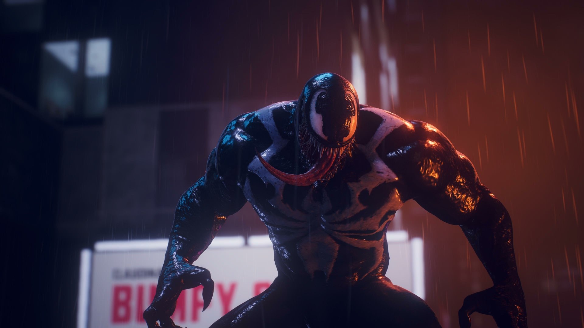 Venom crouched in rain on a neon-lit city street, black symbiote gleaming with white spider emblem — 4K Ultra HD PC desktop wallpaper from Marvel's Spider-Man 2 (PlayStation 5).