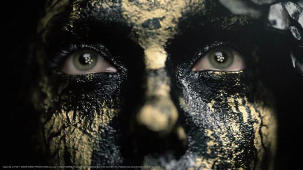 HD wallpaper featuring intense eyes with black textured paint, inspired by Death Stranding 2: On The Beach video game for desktop background.