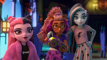 HD wallpaper featuring characters from the TV show Monster High, showcasing three stylish teenage monsters with vibrant hair and unique outfits, set against a spooky backdrop.