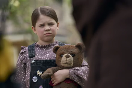 Young girl with a stern expression holding a teddy bear from the movie Imaginary (2024), HD desktop wallpaper.