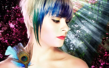 Artistic HD desktop wallpaper featuring a woman with multicolored hair and a peacock feather against a vibrant, nature-inspired background with light rays.
