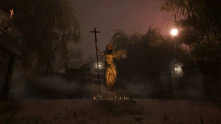 HD wallpaper of a mysterious statue from the 2024 video game Alone in the Dark, set in a foggy, eerie cemetery under a dimly-lit night sky.