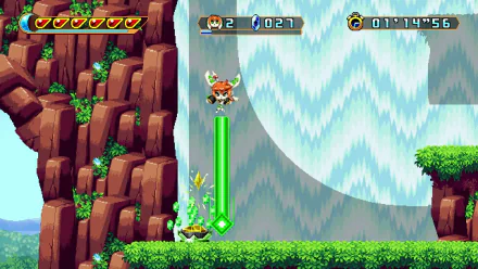 HD desktop wallpaper featuring a scene from the video game Freedom Planet 2, showcasing a character leaping through a vibrant, pixelated landscape with a cascading waterfall in the background.
