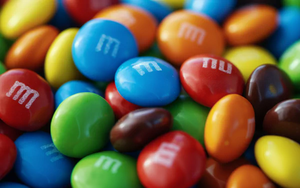 HD Wallpaper of colorful M&M's candy assortment for desktop background.