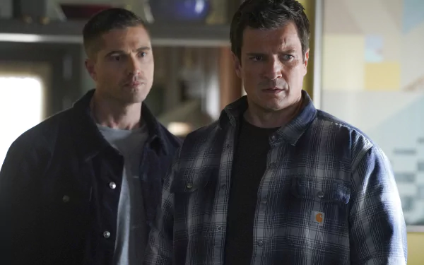 HD desktop wallpaper featuring two characters from the TV show The Rookie standing side-by-side with a focused expression.