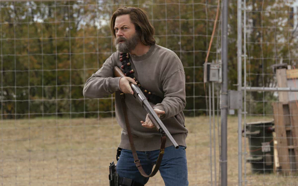 HD desktop wallpaper featuring a character from the TV show The Last of Us, portrayed by actor resembling Nick Offerman, holding a shotgun with a guarded expression in an outdoor setting.
