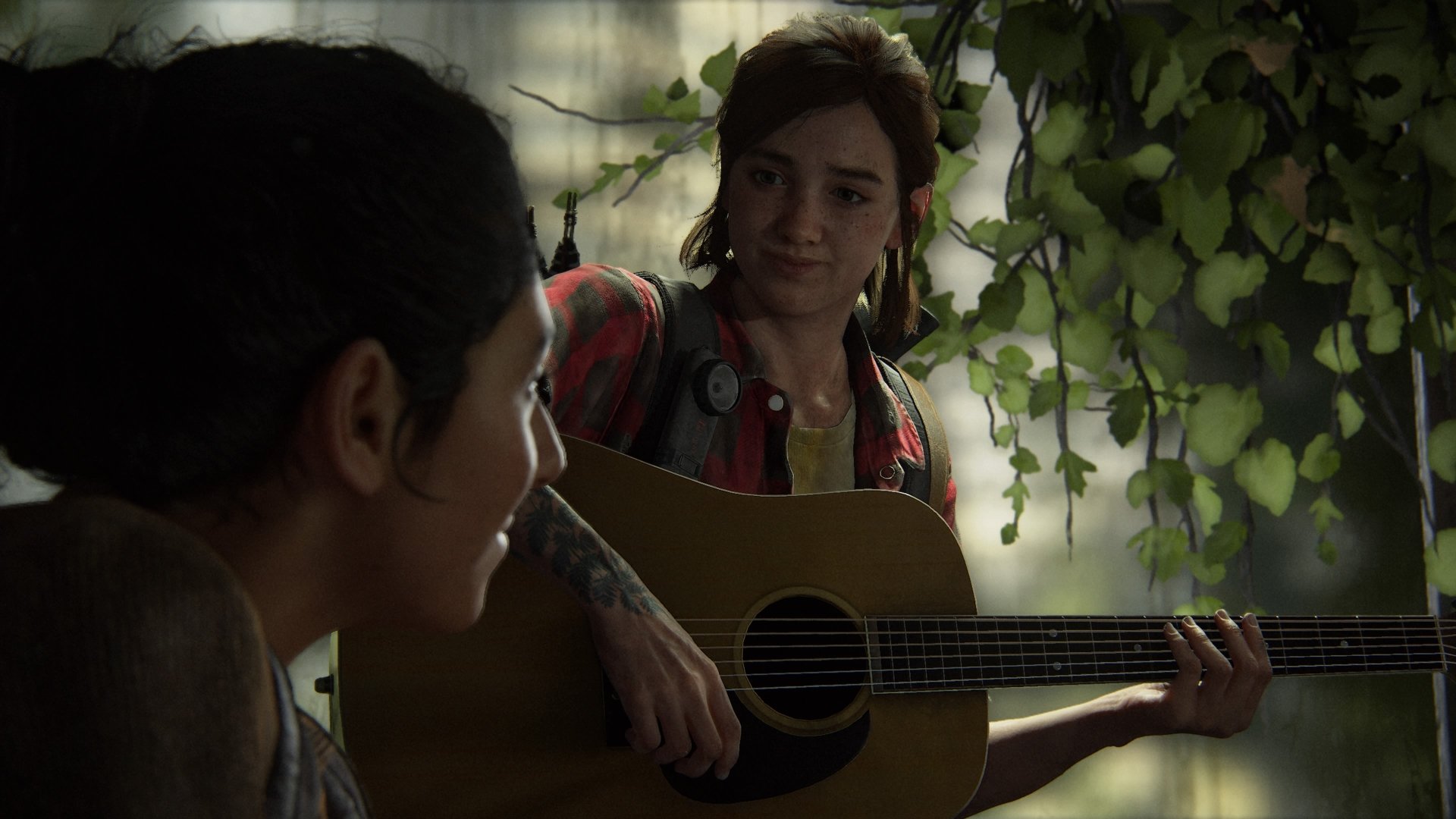 Ellie and Dina from The Last of Us Part II share a quiet moment as Ellie plays guitar in this 4K Ultra HD PC desktop wallpaper.
