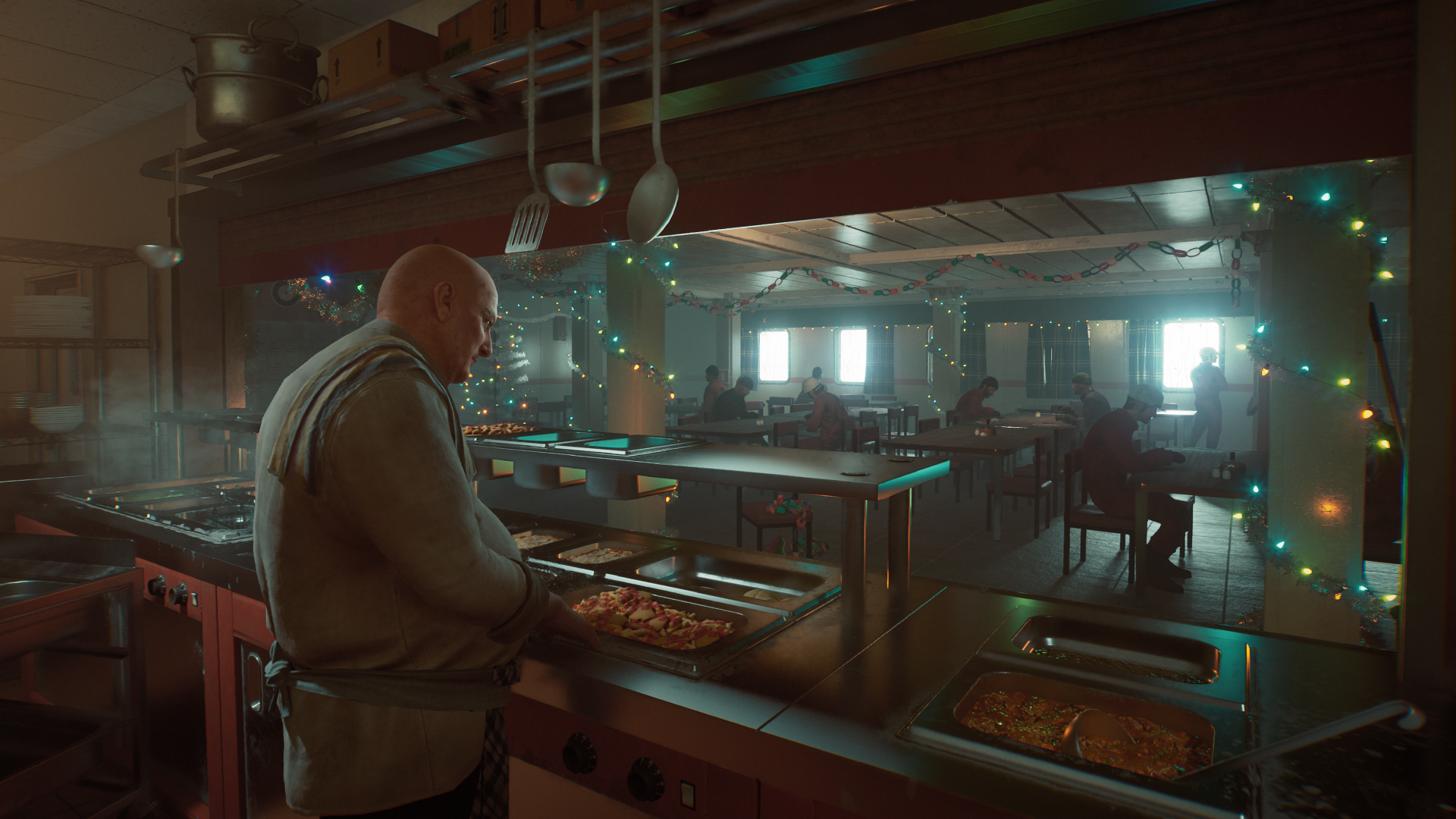 HD desktop wallpaper and background from the video game Still Wakes the Deep, depicting a chef in a dimly lit kitchen with festive string lights and people dining in the background.