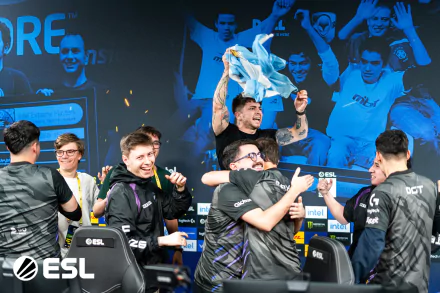9z Team players celebrating their victory at an esports event, with ESL branding in the background. High-definition desktop wallpaper showcasing the excitement of competitive gaming.
