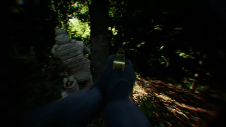 HD desktop wallpaper featuring a first-person view from a video game, resembling a bodycam perspective in a dense forest setting, with a gloved hand holding a firearm and a soldier in tactical gear ahead.