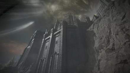 HD PC desktop wallpaper showcasing a towering, dark fortress from Elden Ring: Shadow of the Erdtree, set against a moody, misty sky.