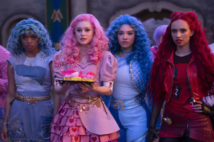 HD desktop wallpaper from the movie Descendants: The Rise of Red, featuring characters dressed in vibrant costumes with colorful hair, standing together in a dramatic scene.