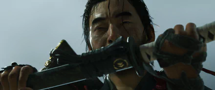 HD PC desktop wallpaper from Ghost of Tsushima featuring a close-up of a character holding a katana with water droplets on his face.