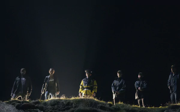 HD desktop wallpaper from the TV show Bodkin featuring a group of characters illuminated by a solitary light in a dark setting.