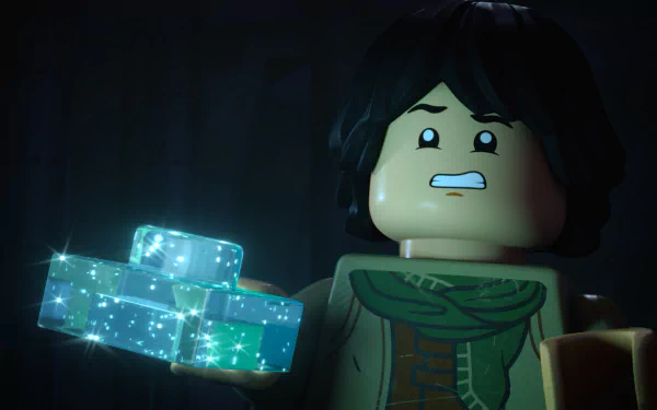 HD desktop wallpaper from LEGO Star Wars: Rebuild the Galaxy, showing a LEGO character holding glowing cubes.
