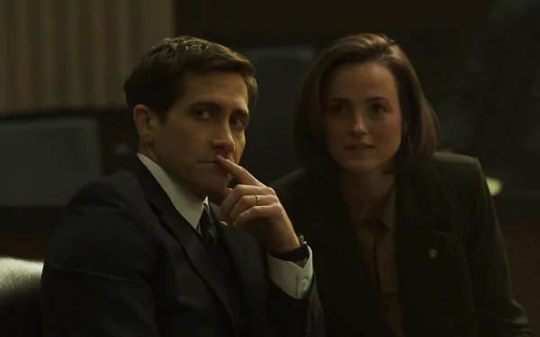 HD desktop wallpaper of Jake Gyllenhaal from the TV show Presumed Innocent (2024), depicting a tense courtroom scene.