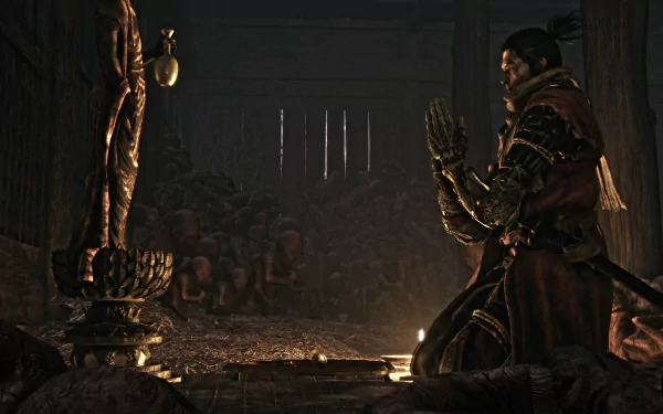 Sekiro kneels in prayer before a statue in a dark, mysterious setting from the game Sekiro: Shadows Die Twice. This HD desktop wallpaper captures the game's atmospheric and immersive world.