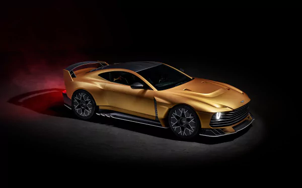 HD desktop wallpaper featuring a sleek, golden Aston Martin Valiant car with a dark background.