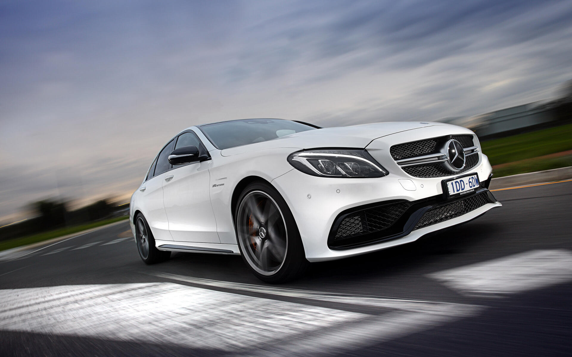 A sleek Mercedes-Benz C63 AMG displayed as a stunning HD desktop wallpaper and background, showcasing its powerful design and luxury performance.